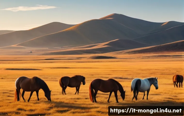 몽골 가을 풍경 사진 명소 - A panoramic view of the Mongolian steppes in autumn, showcasing vast golden-yellow and deep red gras...